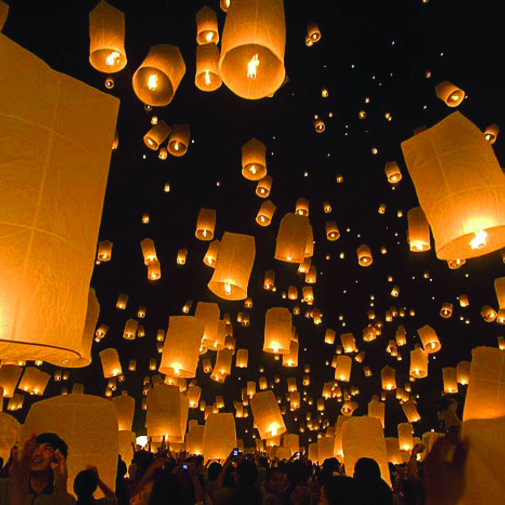 these amazing outdoor paper flying lanterns and watch them soar into the